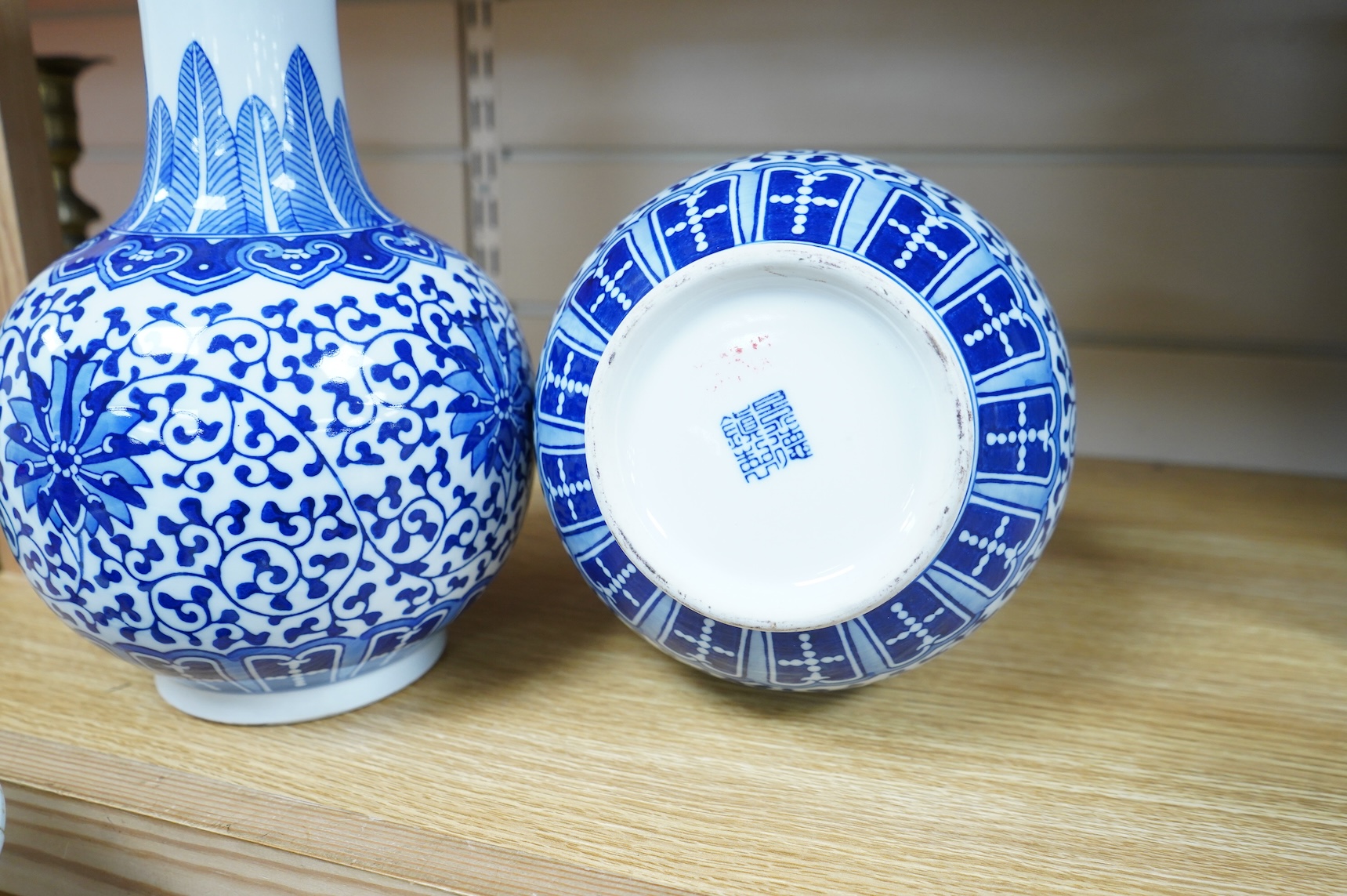 A pair of Chinese blue and white vases, 28cm high